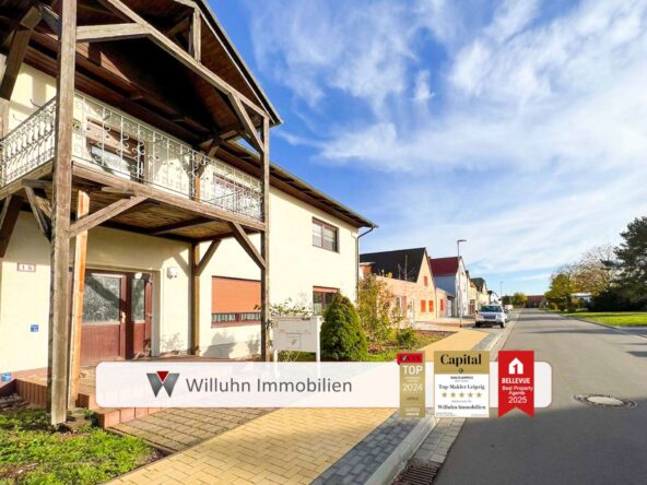Hausansicht mit Straße