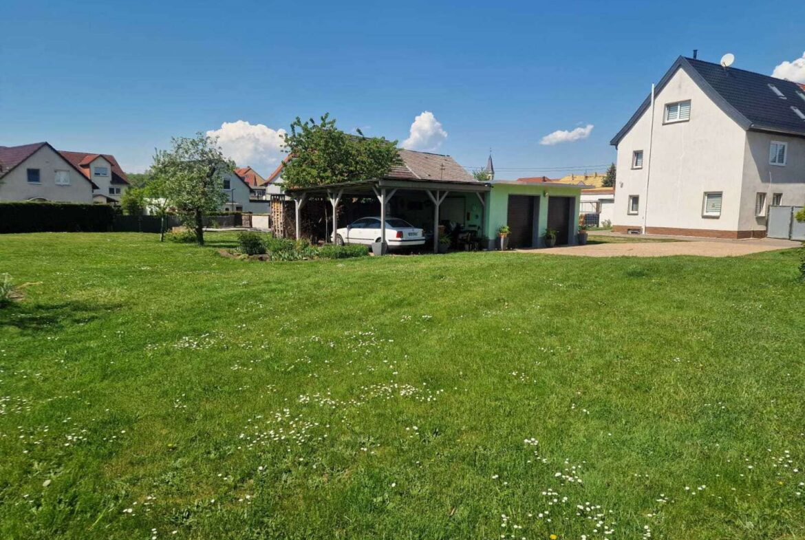 Doppelgarage mit Haus