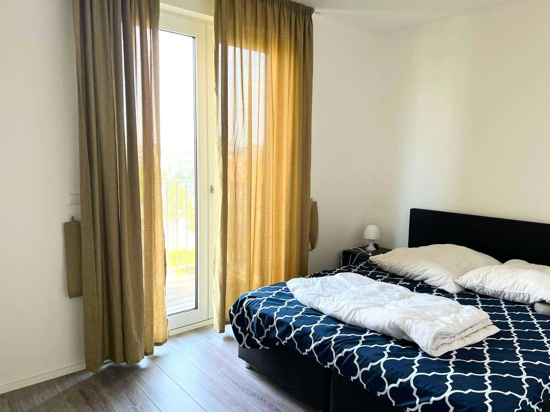 Gemütliches Schlafzimmer mit Terrassenzugang