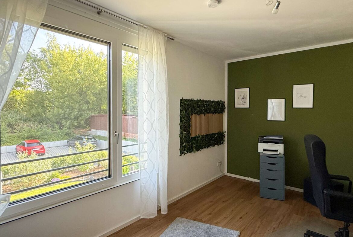 Schlafzimmer 2 im 1. OG