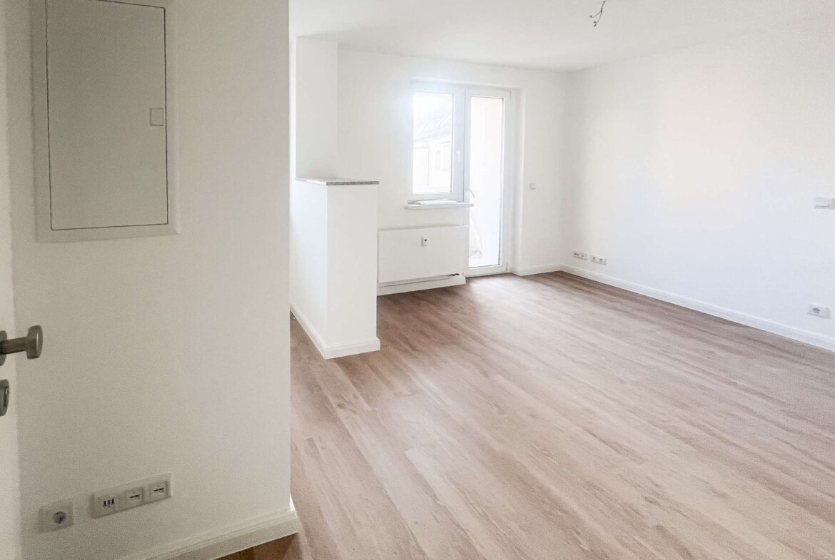 Wohnzimmer mit Küche