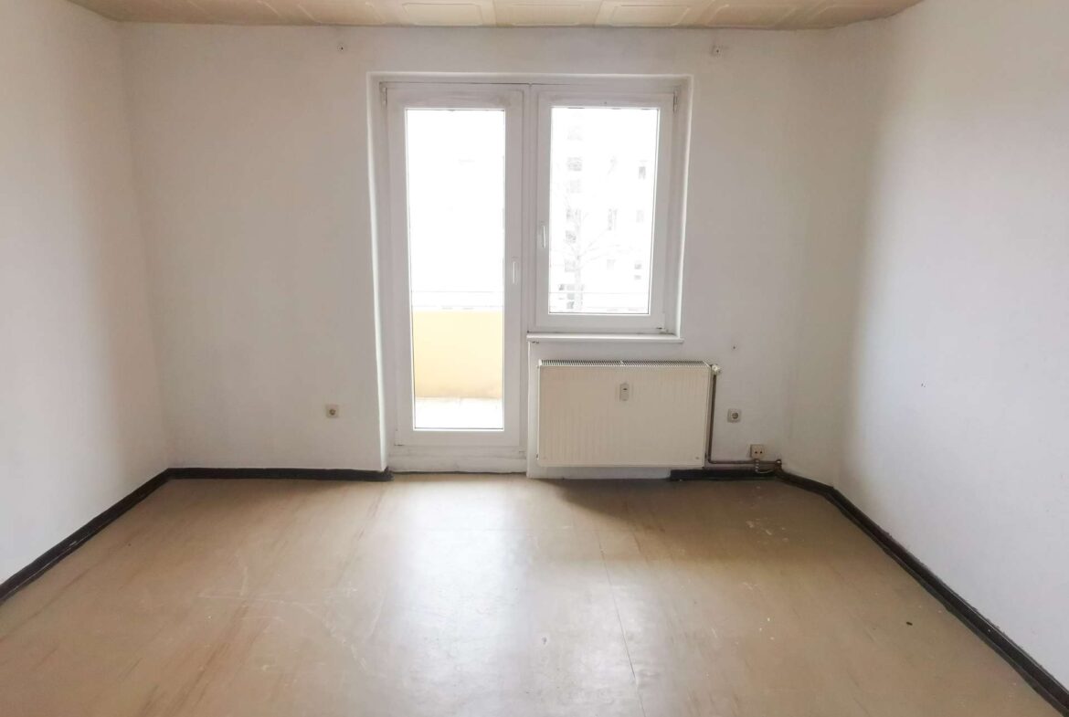 Wohnzimmer mit Balkon