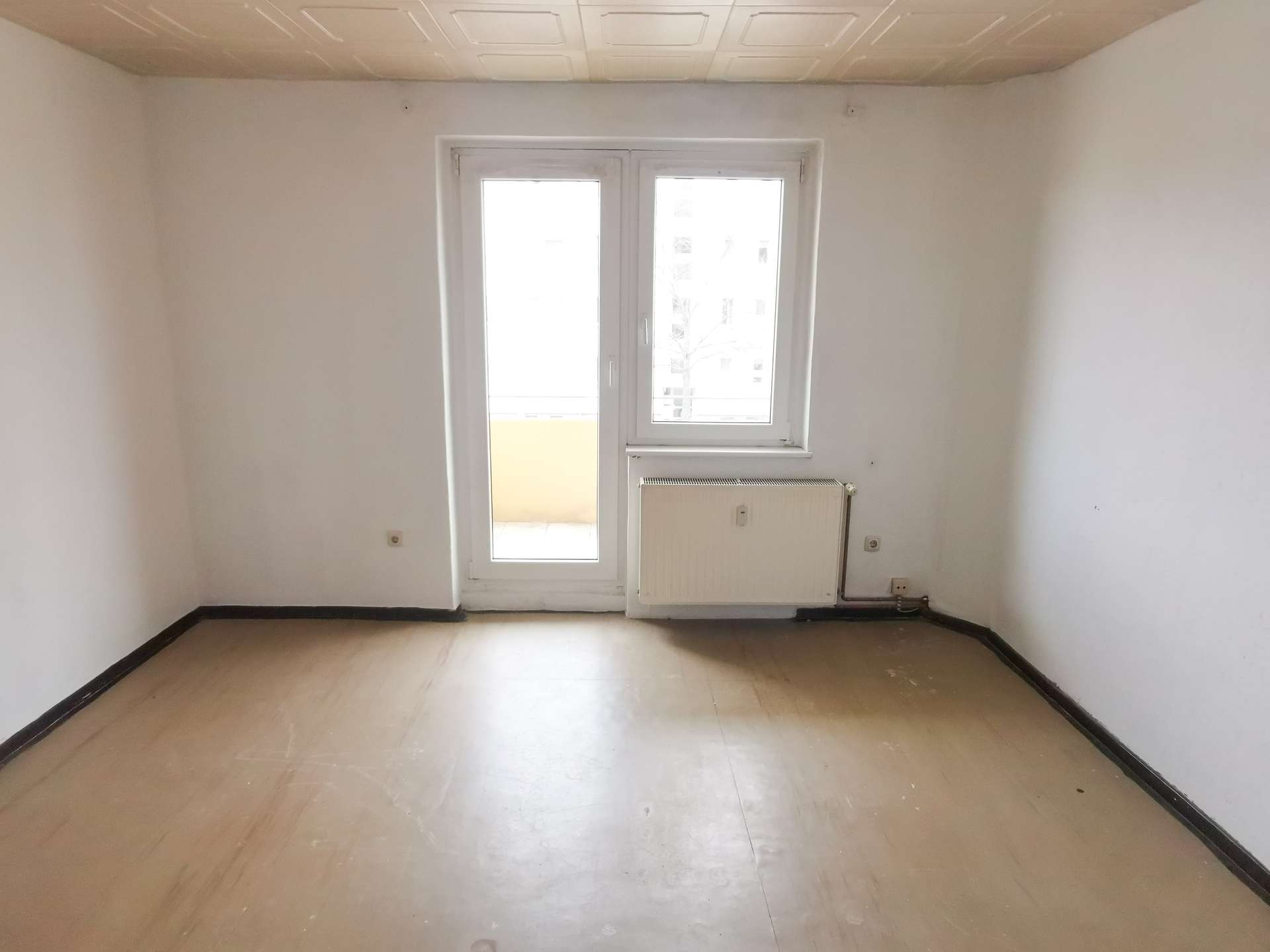 Wohnzimmer mit Balkon