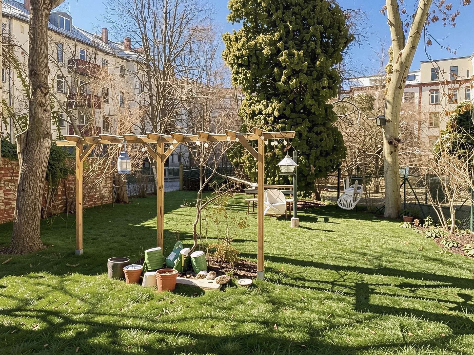 Backyard with a wooden pergola, string lights, and an assortment of empty plant pots on a green lawn.