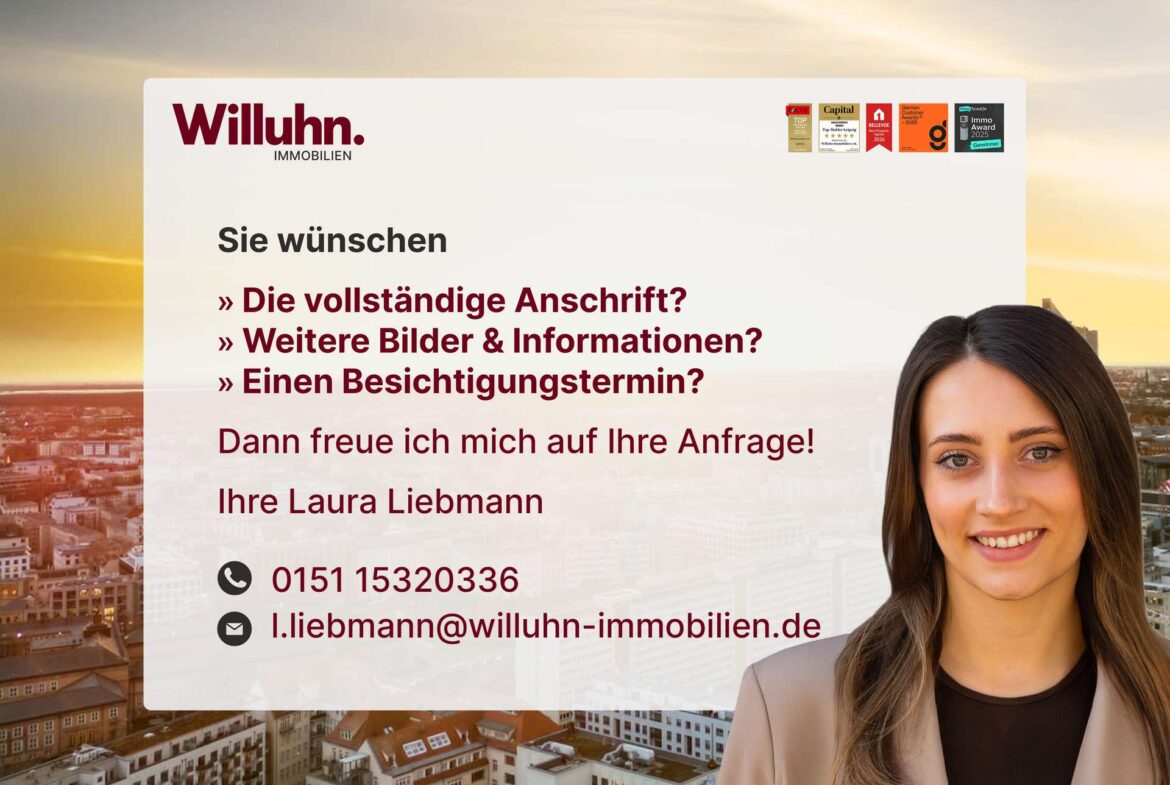 Hero banner for Willuhn Immobilien: smiling woman on the right, city skyline at sunset, white overlay panel with German contact text and awards badges top-right