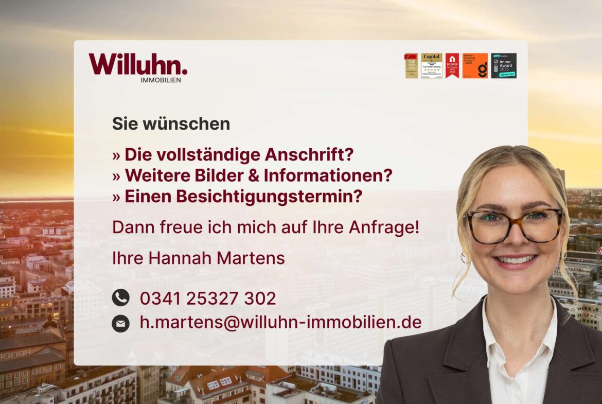 Willuhn Immobilien banner with a smiling businesswoman on the right and German contact text over a city skyline backdrop.