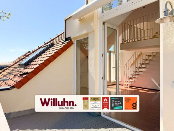 Open sliding glass doors into a modern interior with a metal staircase, and a Willuhn Immobilien real estate sign visible outside the doorway.