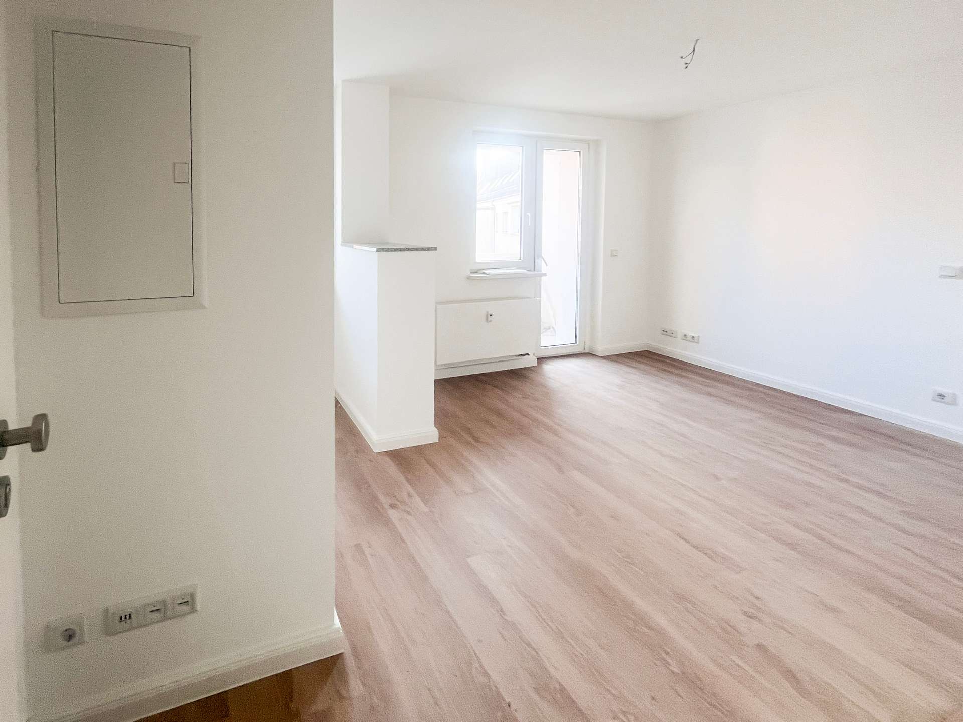 Wohnzimmer mit Küche