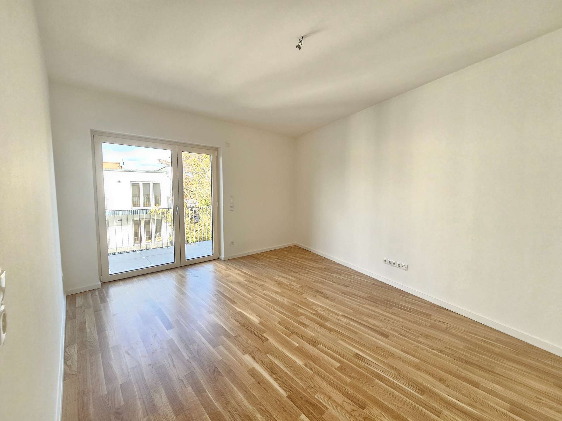 Schlafzimmer mit Balkonzugang