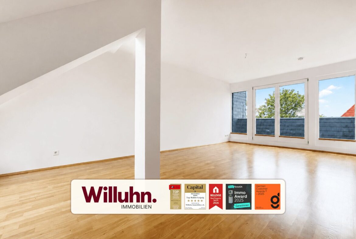 Bright empty living room with hardwood floor and large windows; white walls and a diagonal beam, branding bar along bottom.