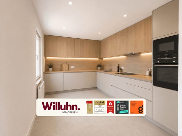 Modern L-shaped kitchen with wood upper cabinets, gray lower cabinets, and under-cabinet lighting; built-in oven on the right.
