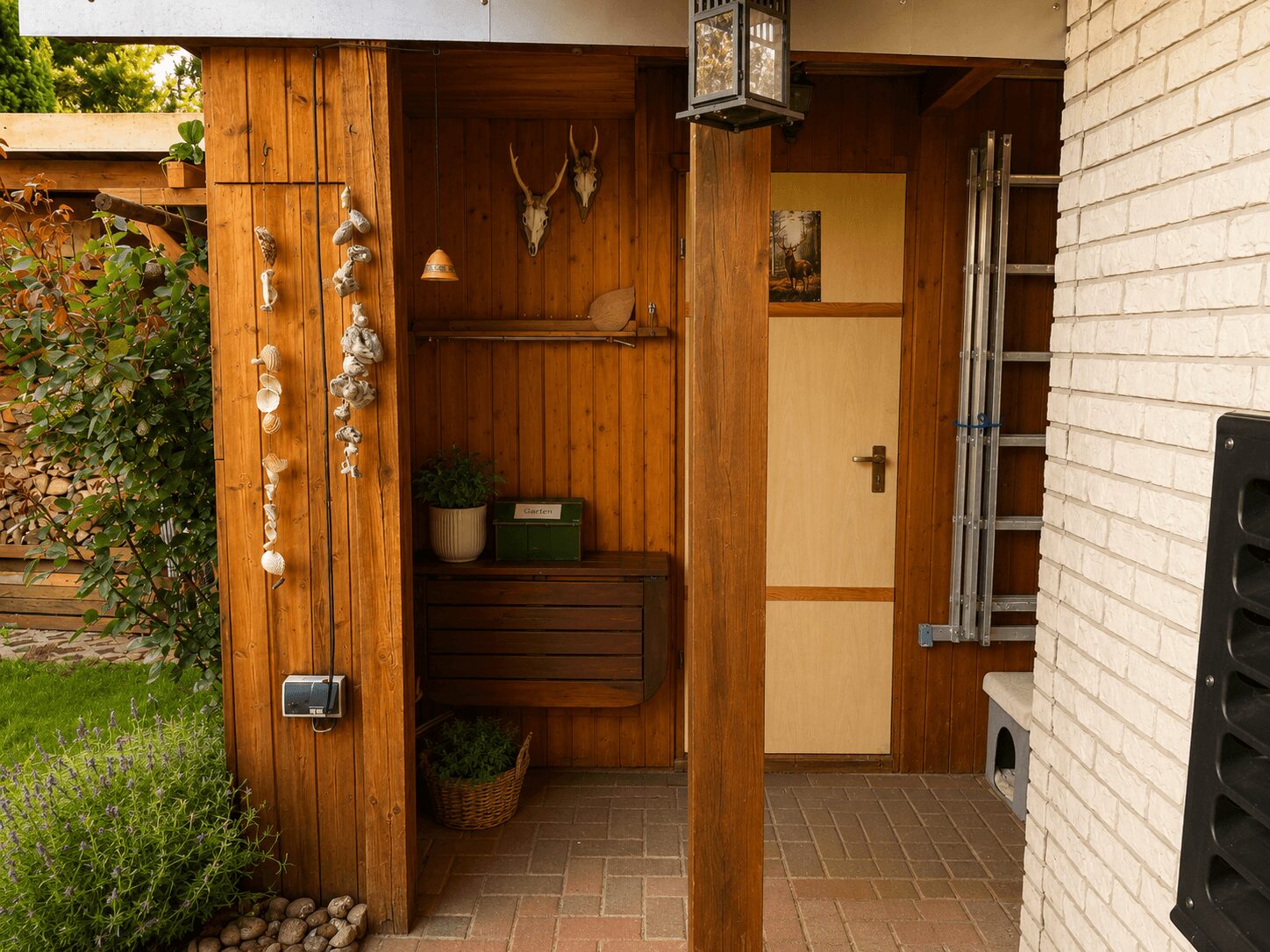 Wooden garden shed alcove with a shell garland, antler decor, potted plant, and a door opening inside the wooden wall.