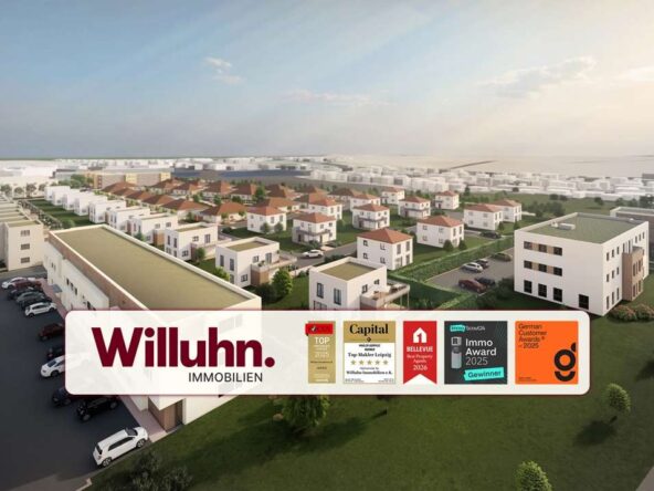 Aerial view of a suburban housing development with white modern homes and a large Willuhn Immobilien banner in the foreground with award badges nearby, sunny sky.