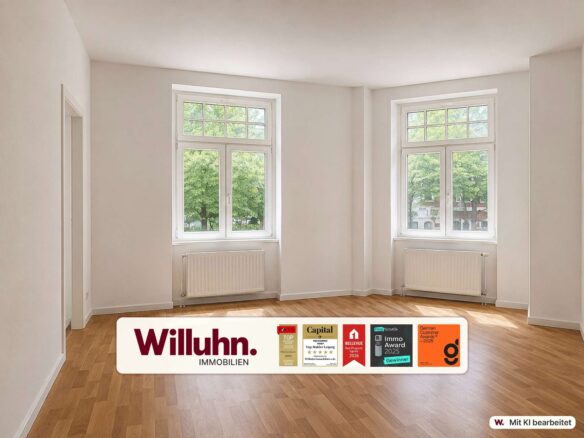 Bright, empty room with two large windows, white walls, and wooden floor; radiator under each window, real estate branding at the bottom.
