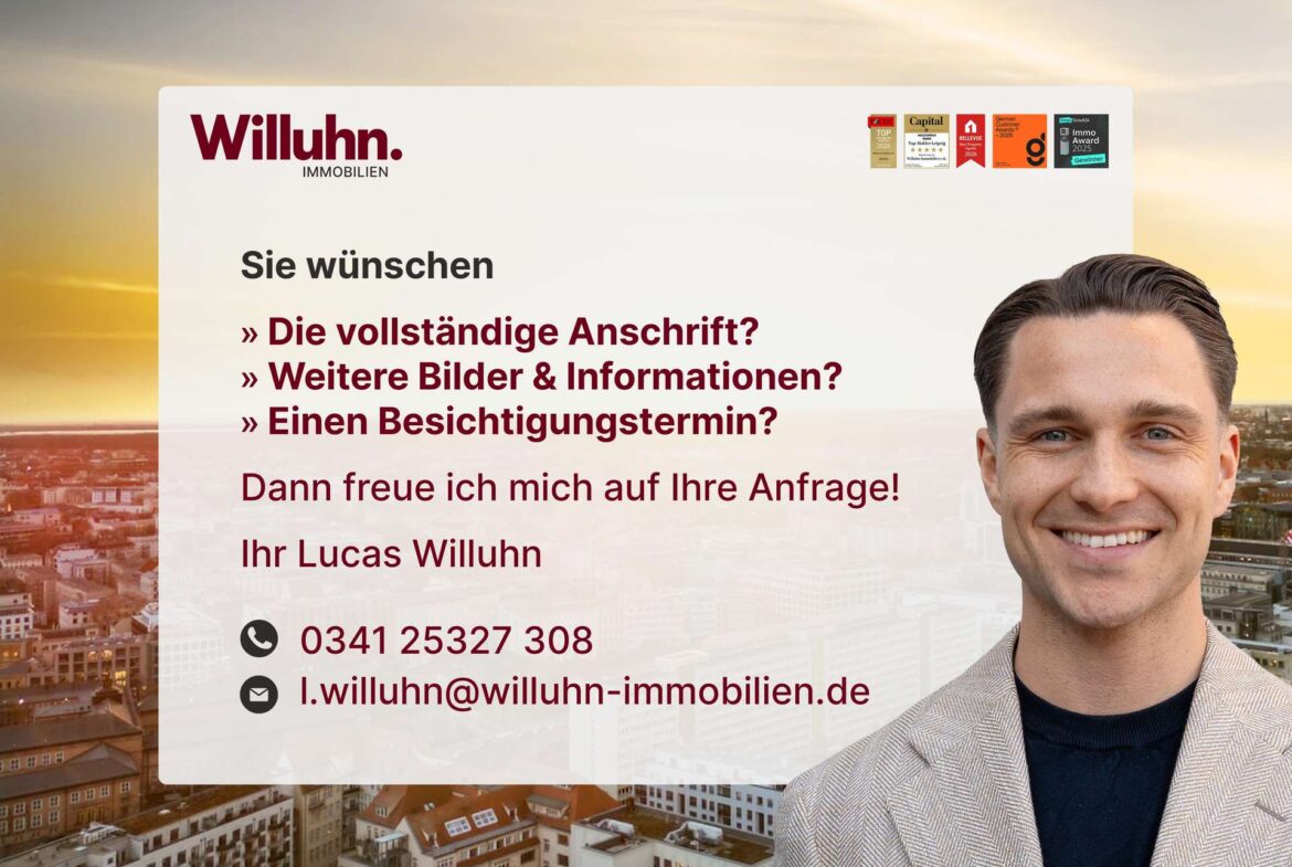 Willuhn Immobilien advertising banner with a smiling man on the right and contact details overlaid on a cityscape background.