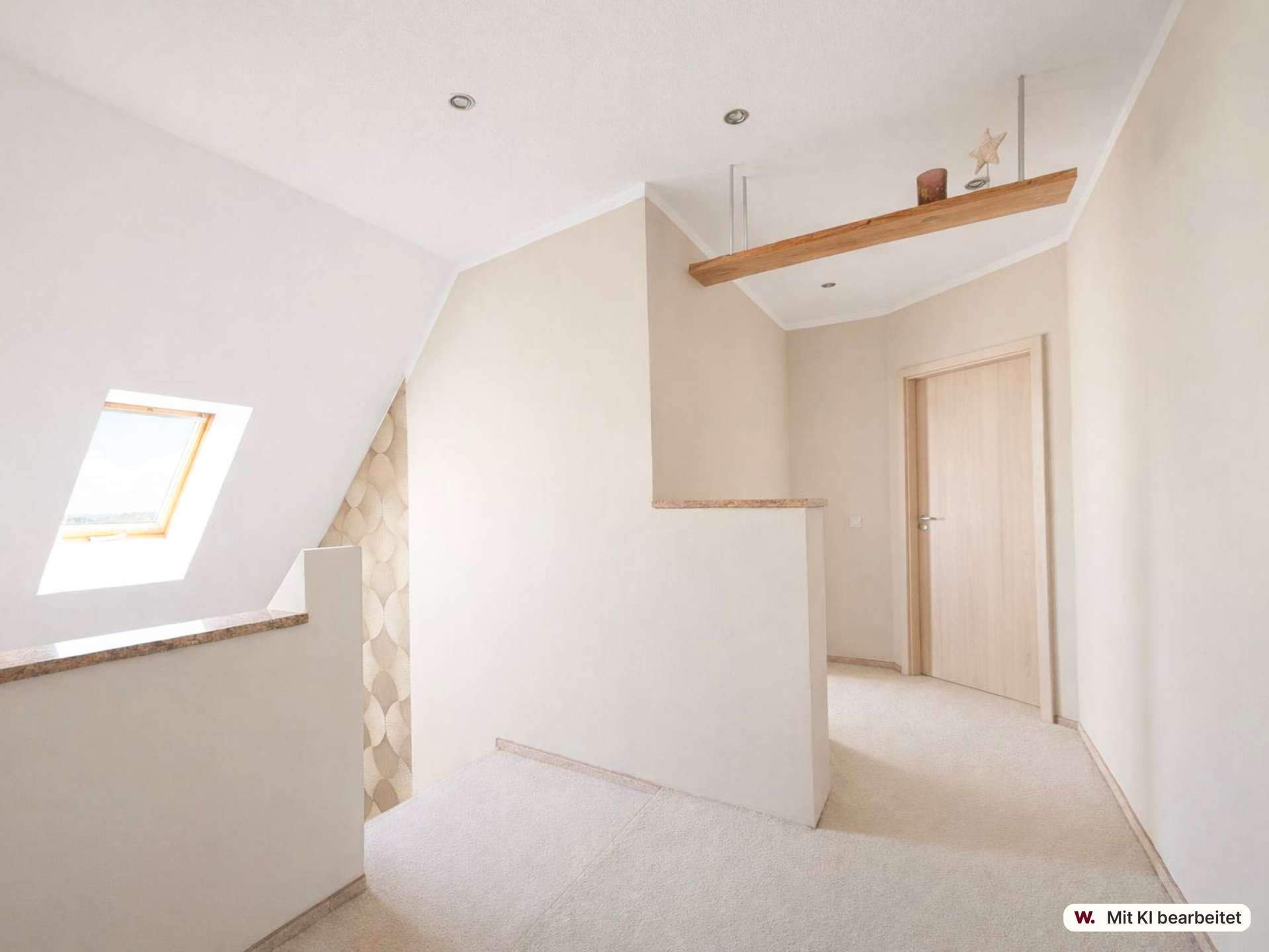Bright beige hallway with a sloped ceiling, skylight window, and a floating wooden shelf near the ceiling.