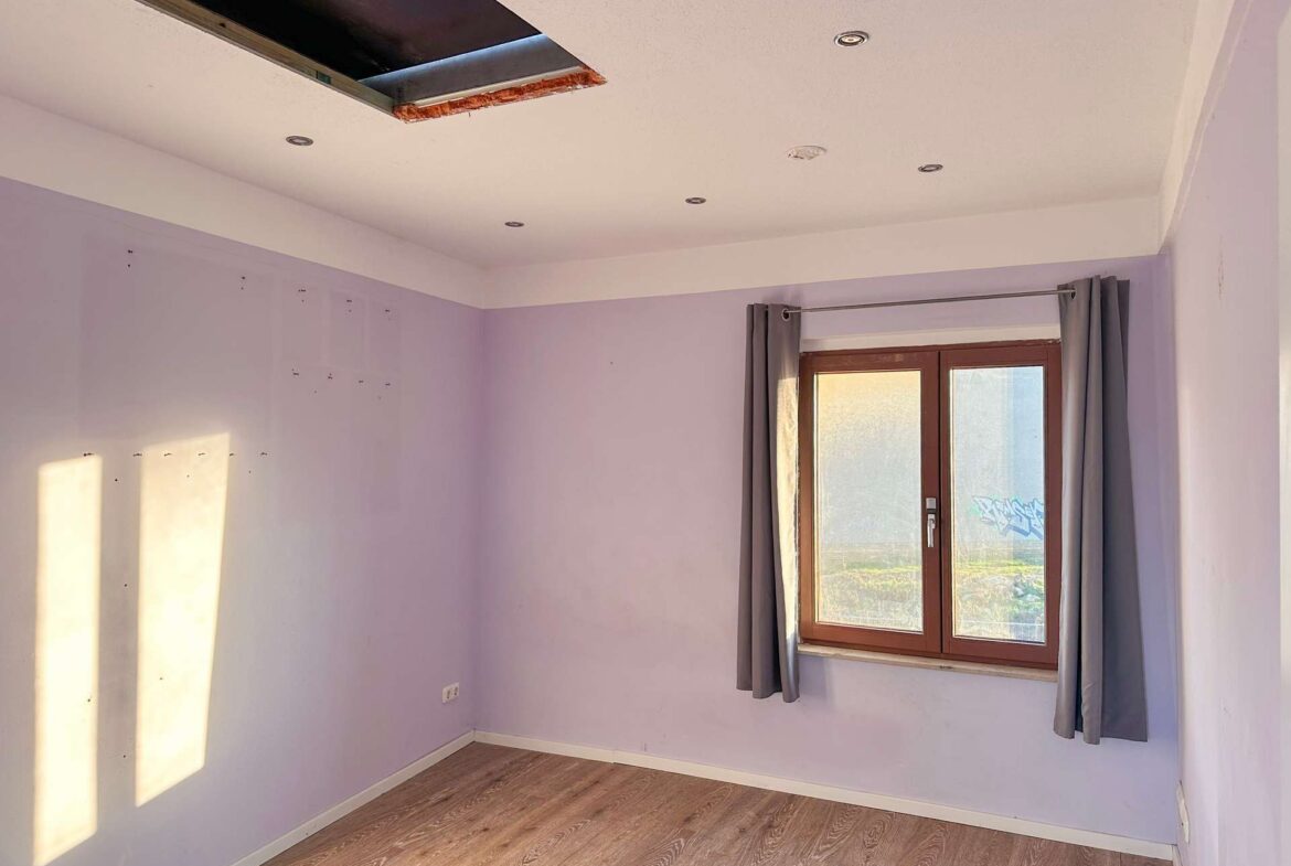 Schlafzimmer mit Spitzboden