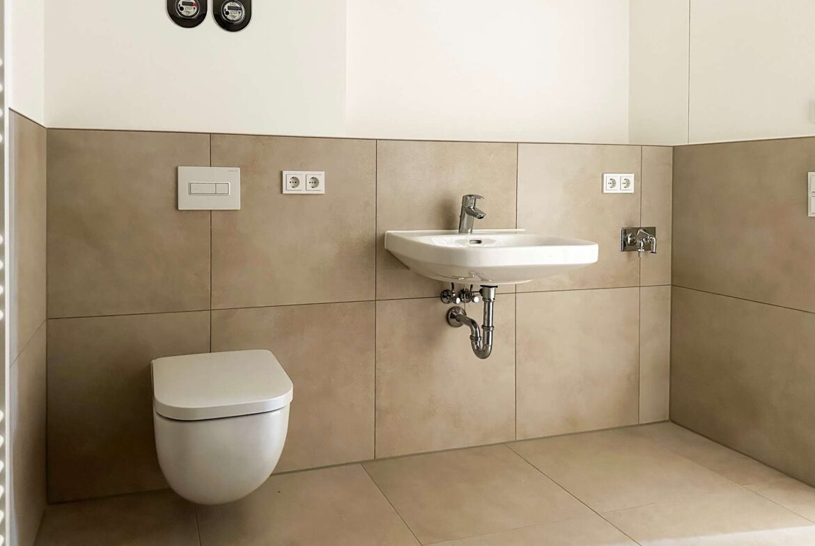 Badezimmer mit Waschmaschinenanschluss