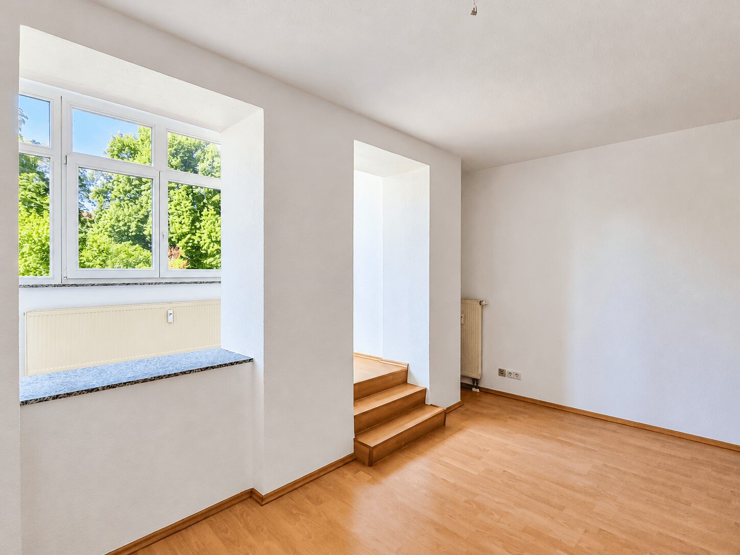 Wohnzimmer mit Wintergarten
